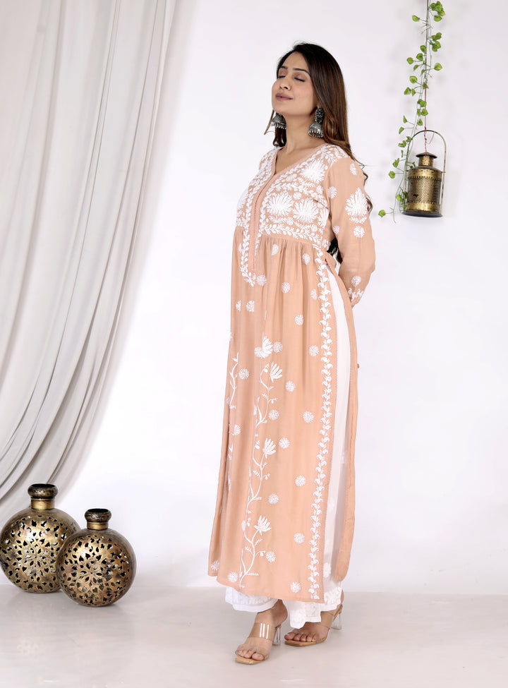 AAIRA MUSLIN CHIKANKARI GOWN